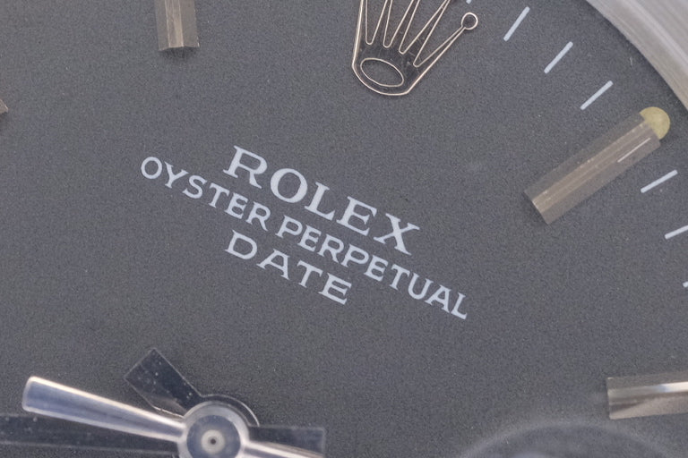 ROLEX σ Oyster Perpetual Date Ref.1500 Matt Black Dial
