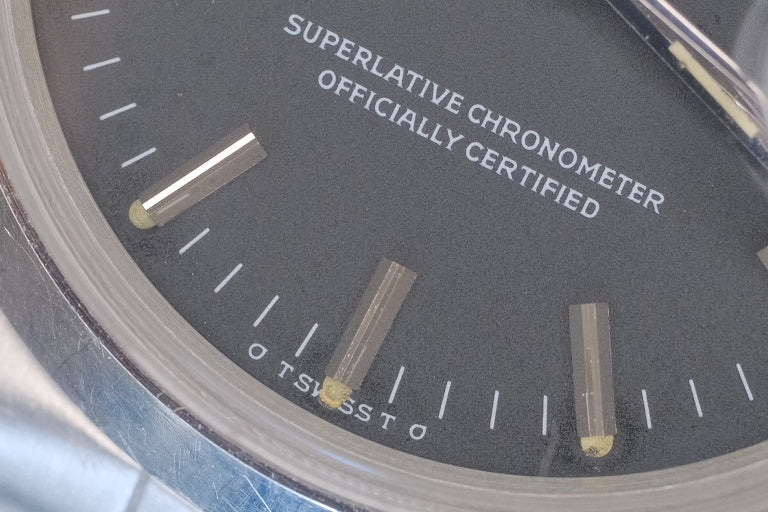 ROLEX σ Oyster Perpetual Date Ref.1500 Matt Black Dial